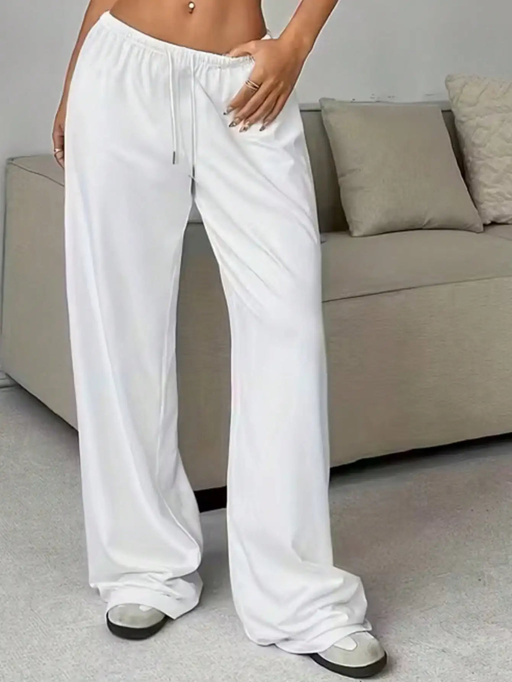 Ladies' casual wide-leg jogging pants, featuring a drawstring elastic waistband, comfortable and loose fit, and a popular style