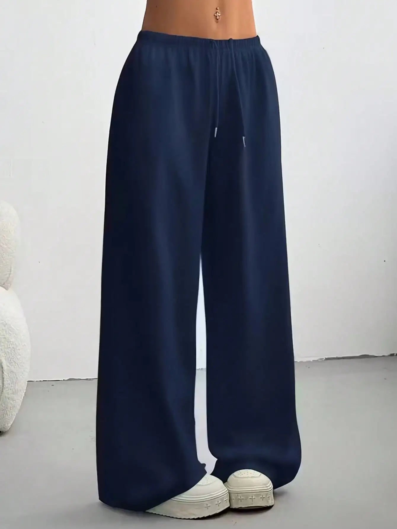 Ladies' casual wide-leg jogging pants, featuring a drawstring elastic waistband, comfortable and loose fit, and a popular style