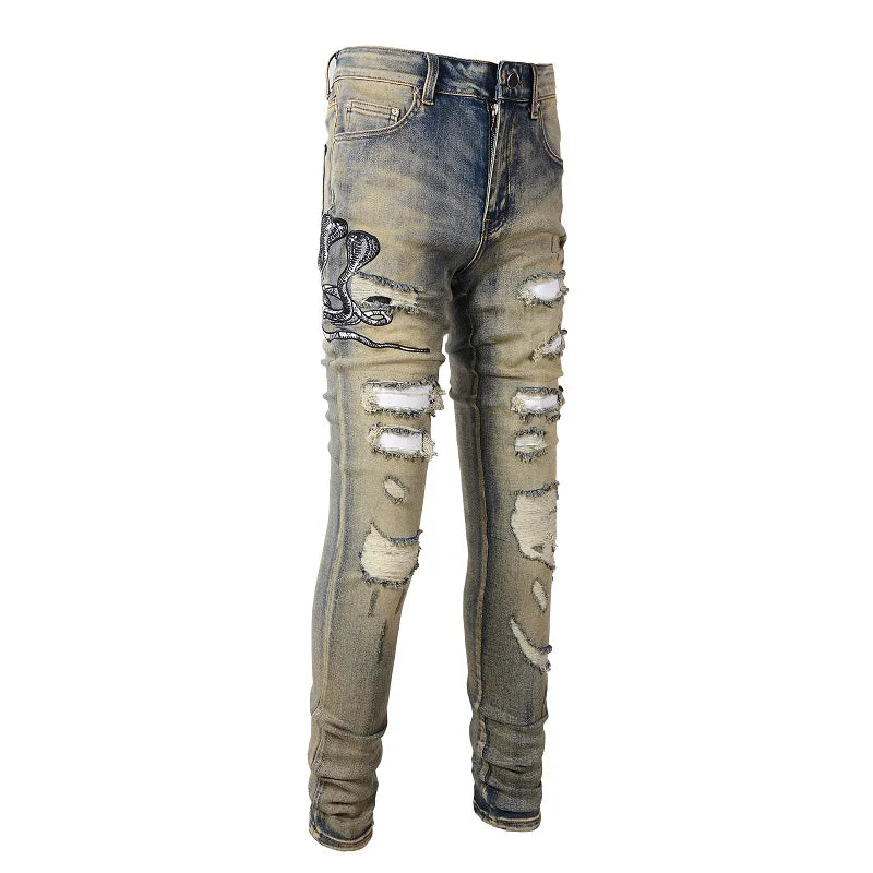 2026 New Men's Fashion Snake Embroidery Denim Jeans Vintage Blue Snakeskin Leather Patch Stretch Pants Skinny Tapered Trousers
