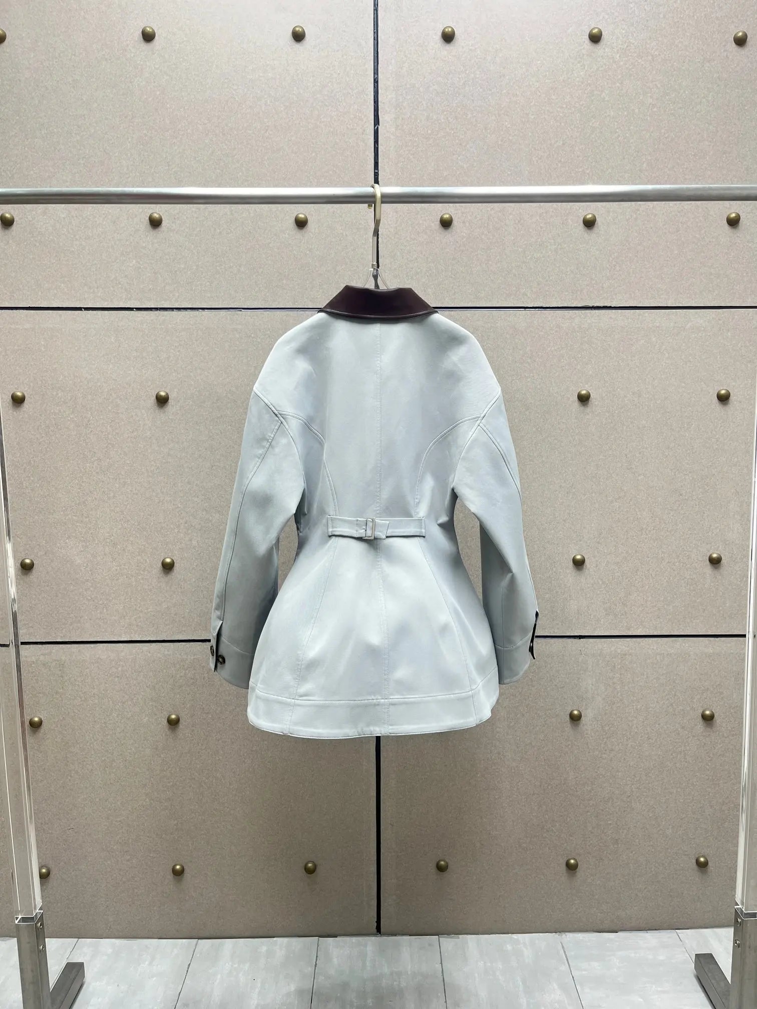 Leather-paneled jacket, a vintage, old-money style contrasting color lapel long-sleeved women's jacket.