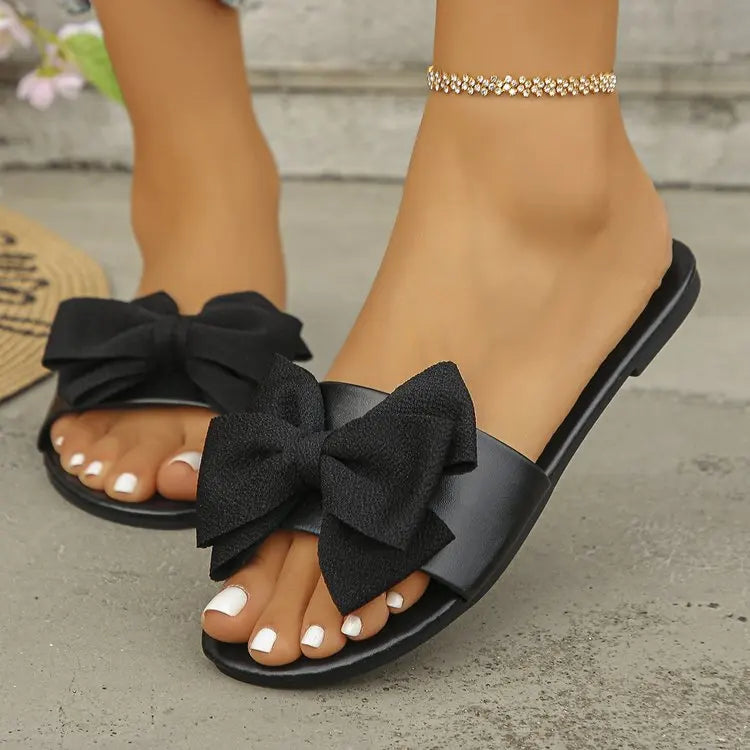 Womens Slip on Flat Sandals Big Bowknot Wide Strap Slides Mules Open Toe Casual Sweet Summer Beach Comfort Daily Walking Shoes
