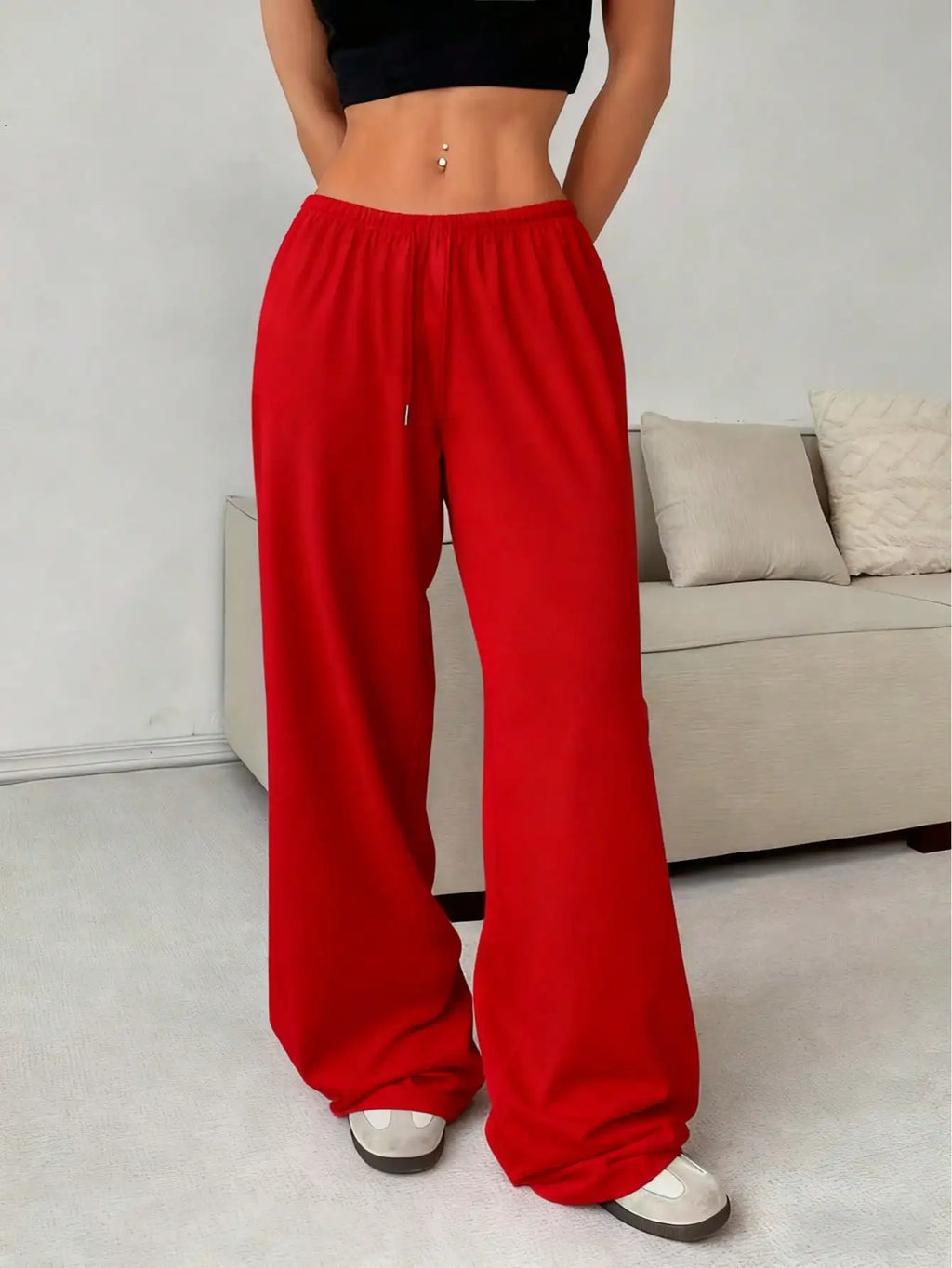 Ladies' casual wide-leg jogging pants, featuring a drawstring elastic waistband, comfortable and loose fit, and a popular style