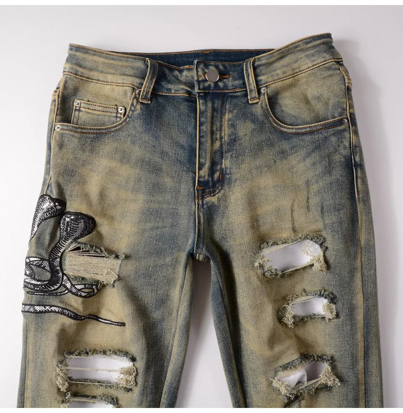 2026 New Men's Fashion Snake Embroidery Denim Jeans Vintage Blue Snakeskin Leather Patch Stretch Pants Skinny Tapered Trousers