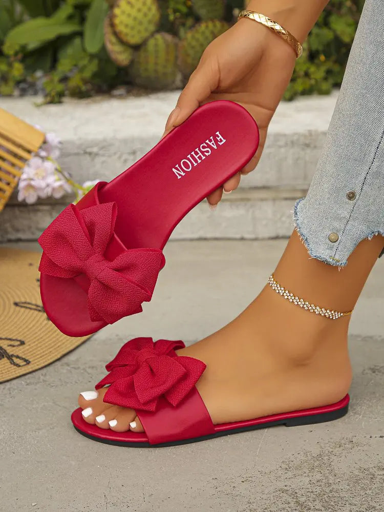 Womens Slip on Flat Sandals Big Bowknot Wide Strap Slides Mules Open Toe Casual Sweet Summer Beach Comfort Daily Walking Shoes