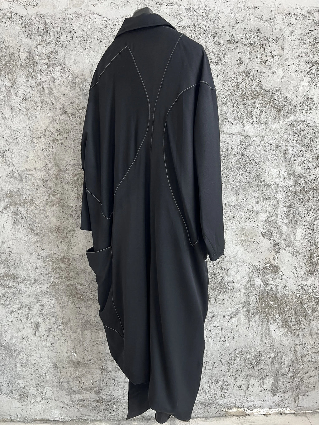 TOP-YAMAMOTO, a niche designer of mid-length trench coats made of pure wool with fringed edges