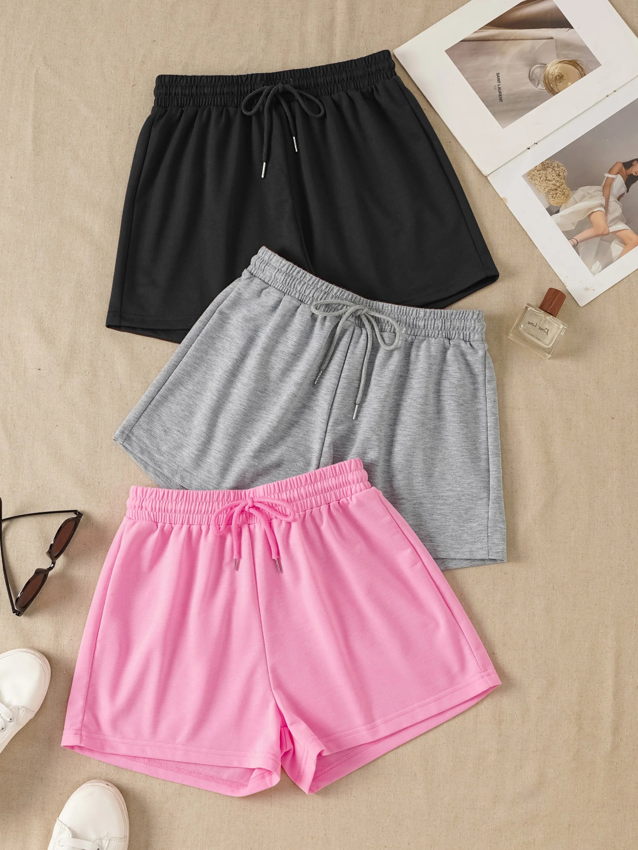 Three Women's Simple Drawstring Sports Shorts, Suitable for Wearing as Outerwear in a Casual Style, Are Comfortable and Soft.