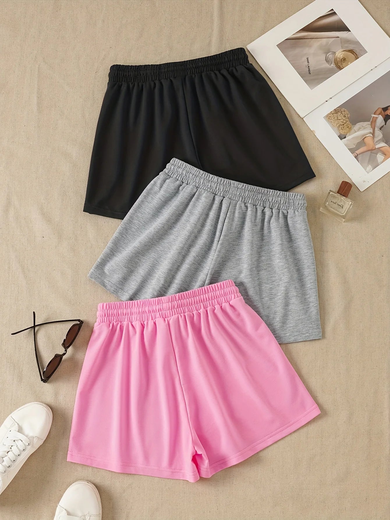Three Women's Simple Drawstring Sports Shorts, Suitable for Wearing as Outerwear in a Casual Style, Are Comfortable and Soft.