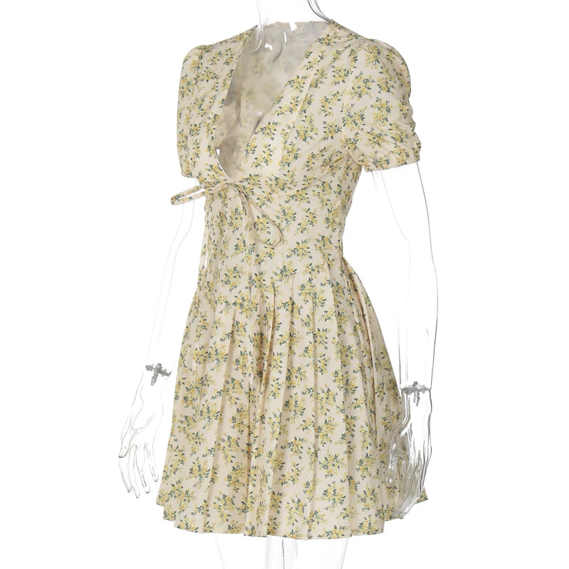 Hugcitar 2026 Floral Print V Neck Short Sleeve Lace Up Zip Up Sexy Slim Pleated Mini Dress Summer Elegant Outfits Party Vacation