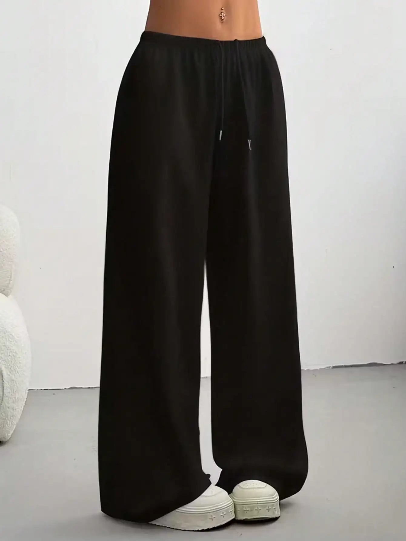 Ladies' casual wide-leg jogging pants, featuring a drawstring elastic waistband, comfortable and loose fit, and a popular style