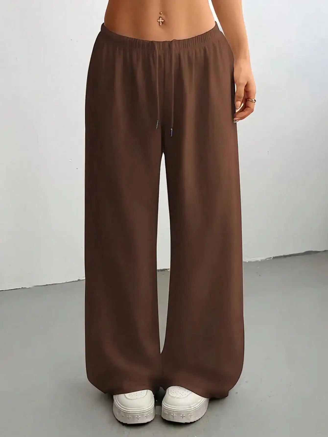 Ladies' casual wide-leg jogging pants, featuring a drawstring elastic waistband, comfortable and loose fit, and a popular style