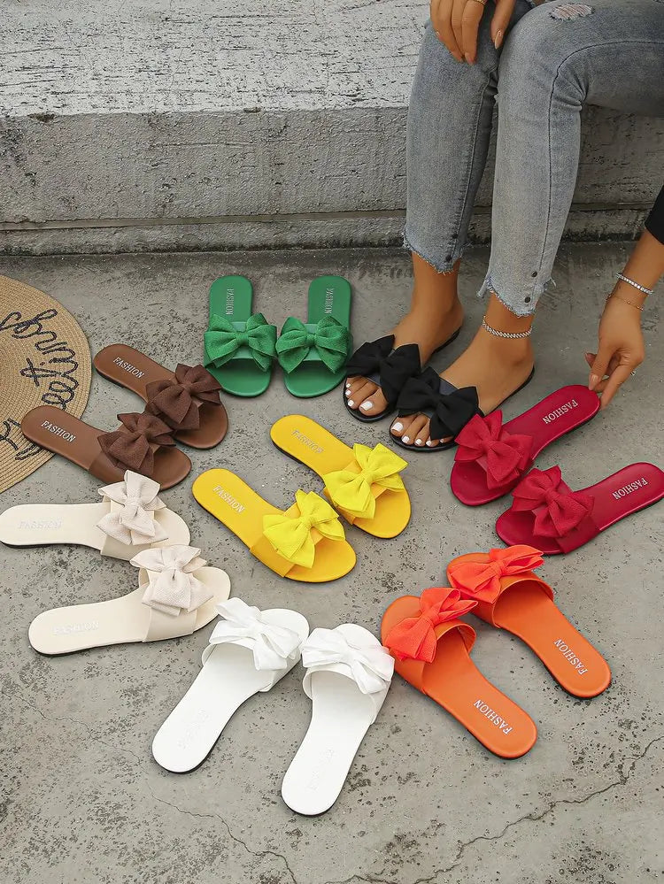 Womens Slip on Flat Sandals Big Bowknot Wide Strap Slides Mules Open Toe Casual Sweet Summer Beach Comfort Daily Walking Shoes