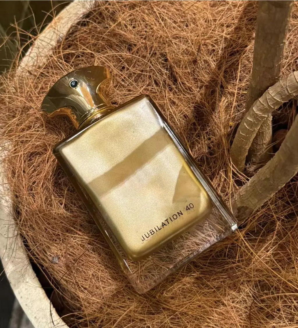 Jubilation 40, a luxurious golden fragrance with rich warm notes. Elegant bottle design, perfect for special occasions, gifts and personal collection.
