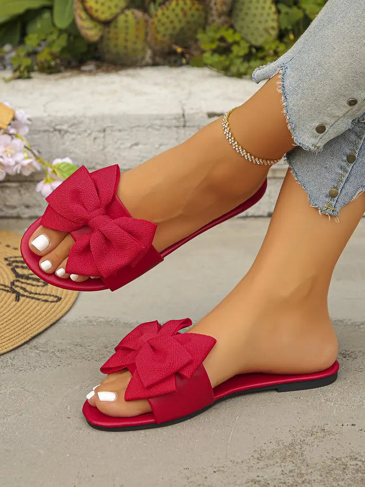Womens Slip on Flat Sandals Big Bowknot Wide Strap Slides Mules Open Toe Casual Sweet Summer Beach Comfort Daily Walking Shoes