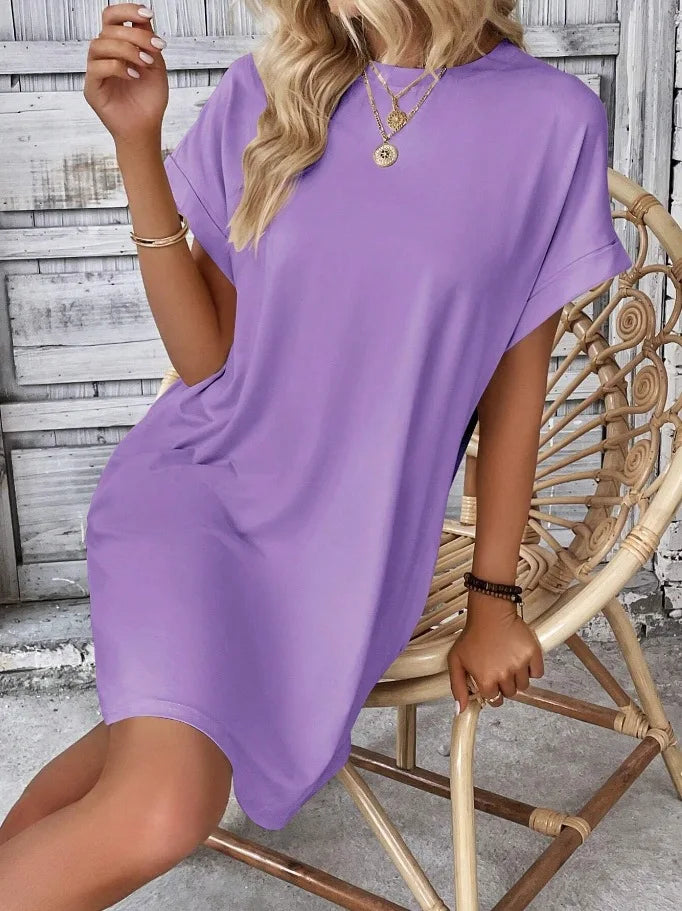 New women's spring and summer fashionable temperament casual commuting solid color round neck loose short sleeved pocket dress