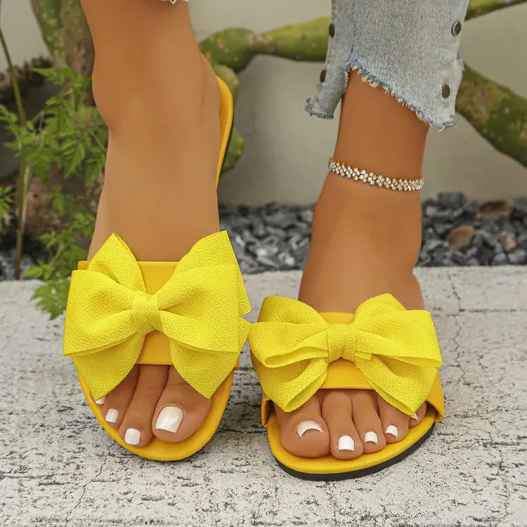 Womens Slip on Flat Sandals Big Bowknot Wide Strap Slides Mules Open Toe Casual Sweet Summer Beach Comfort Daily Walking Shoes