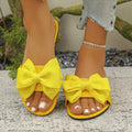 Womens Slip on Flat Sandals Big Bowknot Wide Strap Slides Mules Open Toe Casual Sweet Summer Beach Comfort Daily Walking Shoes