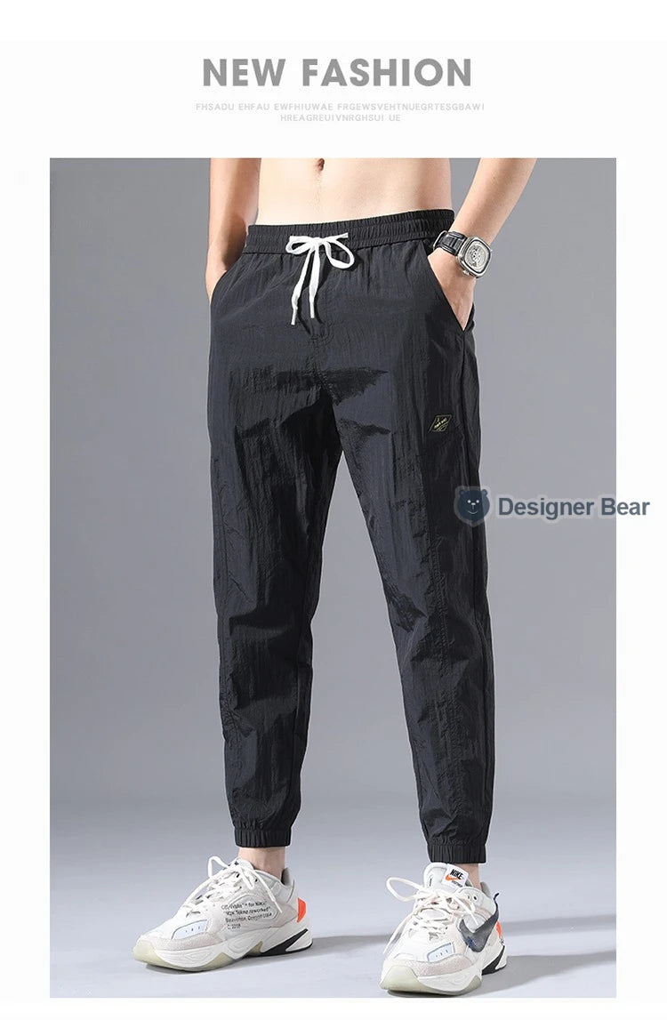 2026 Summer Thin Men's Wrinkled Fabric Loose Tapered Harem Pants Quick-Dry Elastic Cuff Casual Trousers Elastic Waist City Boy