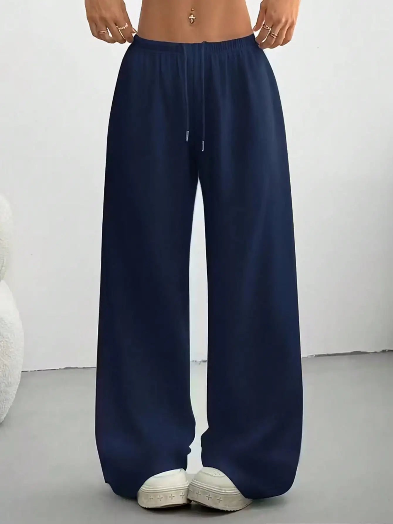 Ladies' casual wide-leg jogging pants, featuring a drawstring elastic waistband, comfortable and loose fit, and a popular style