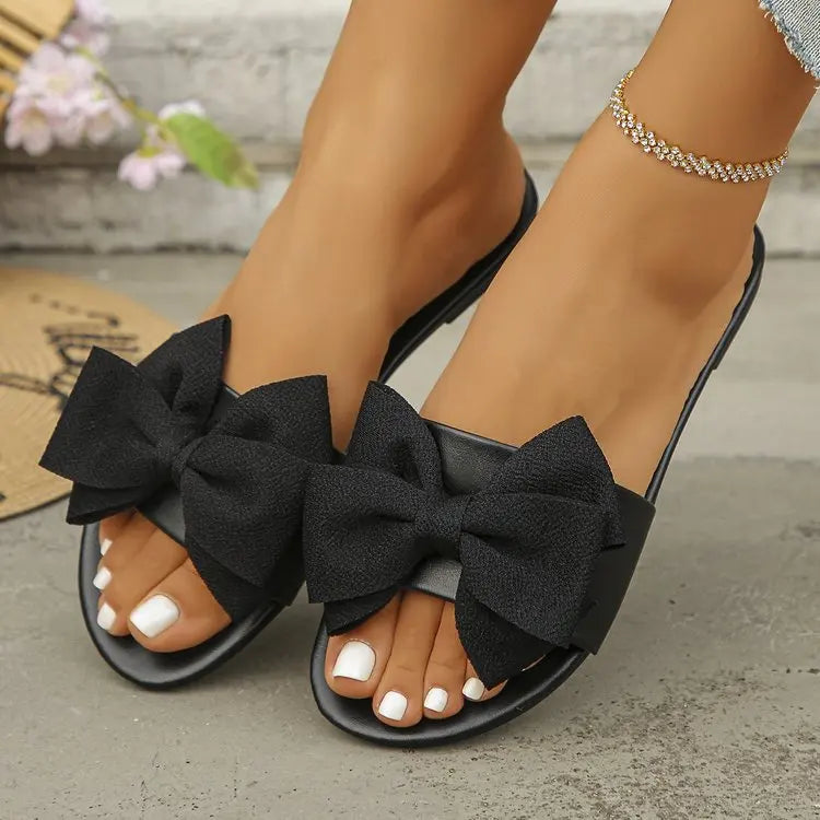 Womens Slip on Flat Sandals Big Bowknot Wide Strap Slides Mules Open Toe Casual Sweet Summer Beach Comfort Daily Walking Shoes