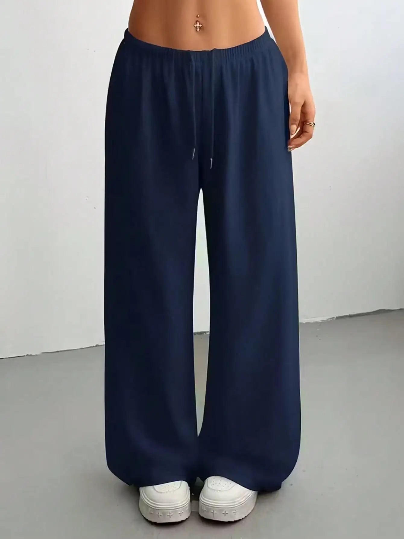 Ladies' casual wide-leg jogging pants, featuring a drawstring elastic waistband, comfortable and loose fit, and a popular style