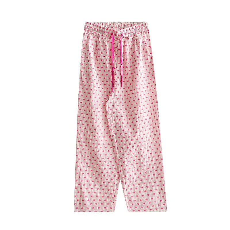 Comfortable home-style heart-printed pajama pants 2025 new casual family pants. The pink pants can be worn as a coat