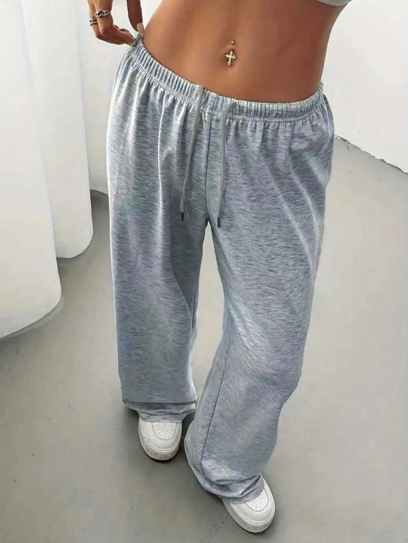 Ladies' casual wide-leg jogging pants, featuring a drawstring elastic waistband, comfortable and loose fit, and a popular style