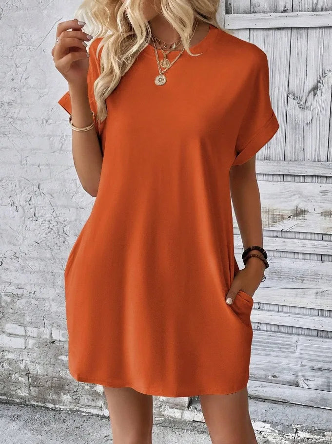 New women's spring and summer fashionable temperament casual commuting solid color round neck loose short sleeved pocket dress