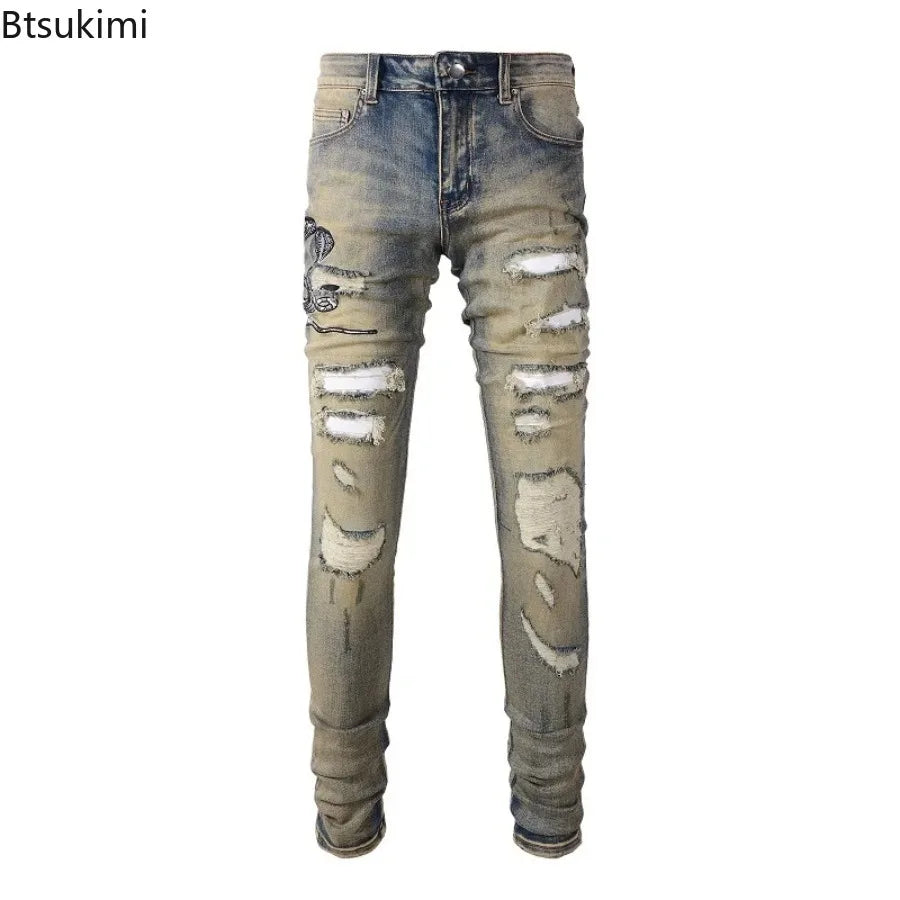 2026 New Men's Fashion Snake Embroidery Denim Jeans Vintage Blue Snakeskin Leather Patch Stretch Pants Skinny Tapered Trousers