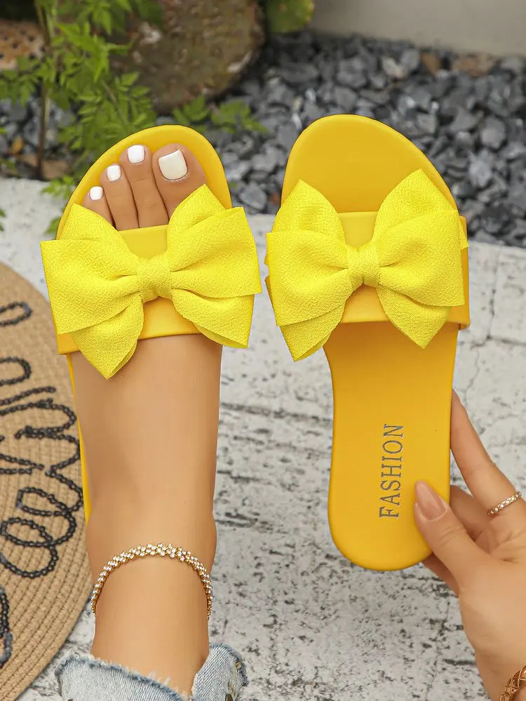 Womens Slip on Flat Sandals Big Bowknot Wide Strap Slides Mules Open Toe Casual Sweet Summer Beach Comfort Daily Walking Shoes