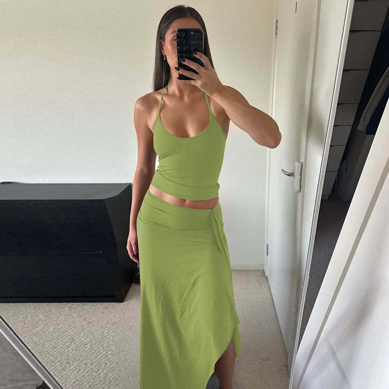 Hugcitar Fashion 2 Pcs Sets Halter Solid Backless Lace Up Sexy Crop Tank Top Ruched Maxi Skirt Women Outfit Beach Vacation Sport