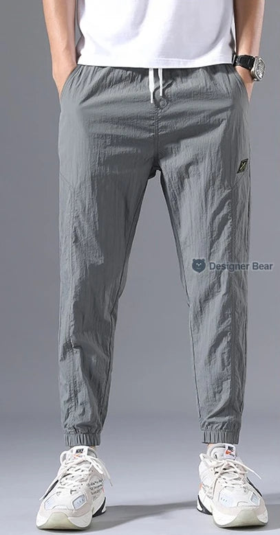 2026 Summer Thin Men's Wrinkled Fabric Loose Tapered Harem Pants Quick-Dry Elastic Cuff Casual Trousers Elastic Waist City Boy