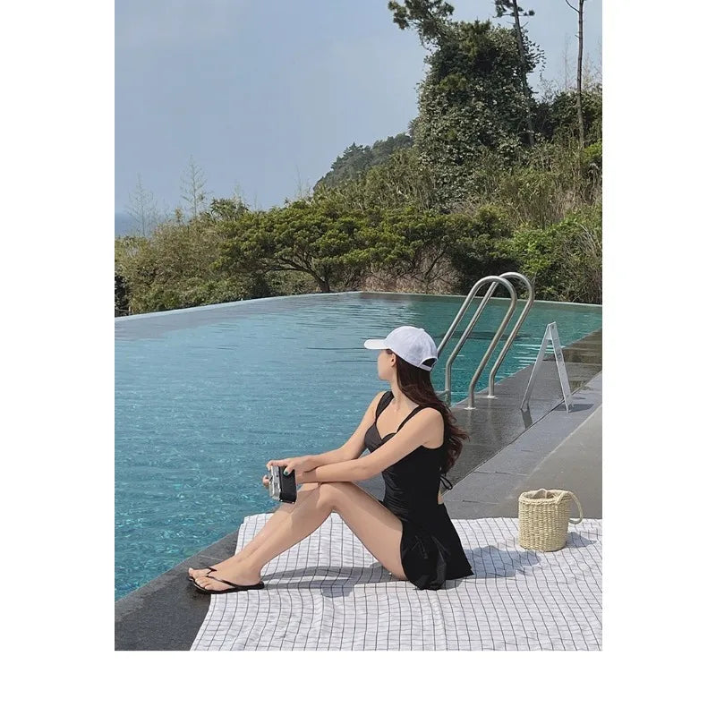 Ladies' Black One-piece Swimsuit with A Sweetheart Collar and A Back Strap That Is Hollowed Out Suitable for Beach Vacations