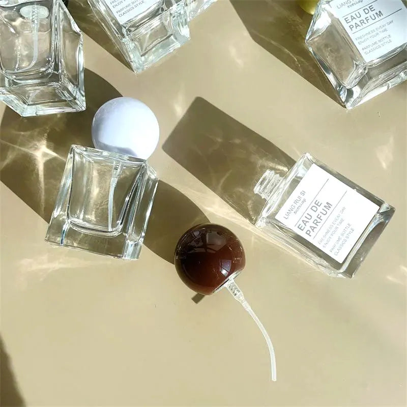 30/50/100ml Refillable Clear Glass Perfume Spray Bottles Fine Mist Atomizer with Sealed Cap Empty Fragrance Cosmetic Container