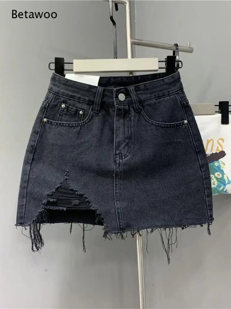 High Ripped Mini Denim Skirt Irregular Raw Fringe Hem Classic Front Pocket Design for Street and Daily Looks