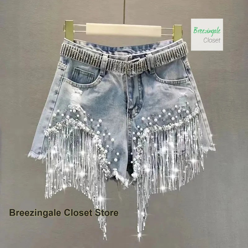 American heavy industry full rhinestone denim shorts women's summer new high waist fashion slim beaded tassels ripped jeans.