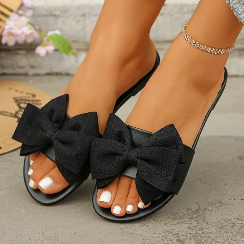 Womens Slip on Flat Sandals Big Bowknot Wide Strap Slides Mules Open Toe Casual Sweet Summer Beach Comfort Daily Walking Shoes