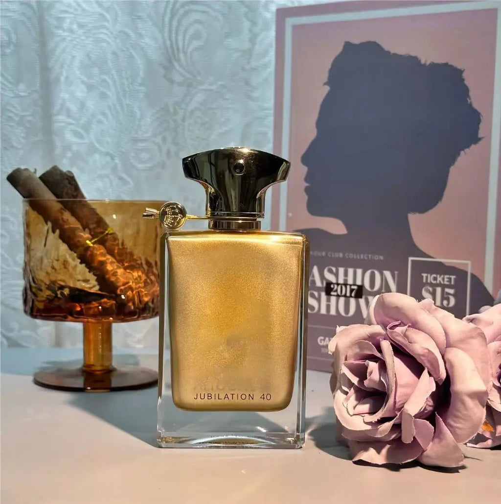 Jubilation 40, a luxurious golden fragrance with rich warm notes. Elegant bottle design, perfect for special occasions, gifts and personal collection.
