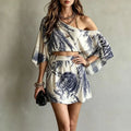 ROSAVA Women Fashion Leaf Print Bohemian Vacation Outfit Sexy Skew Collar Hollow Top A Line Skirt Suit Spring Flare Sleeve Loose