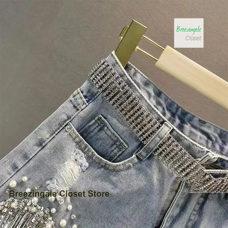 American heavy industry full rhinestone denim shorts women's summer new high waist fashion slim beaded tassels ripped jeans.