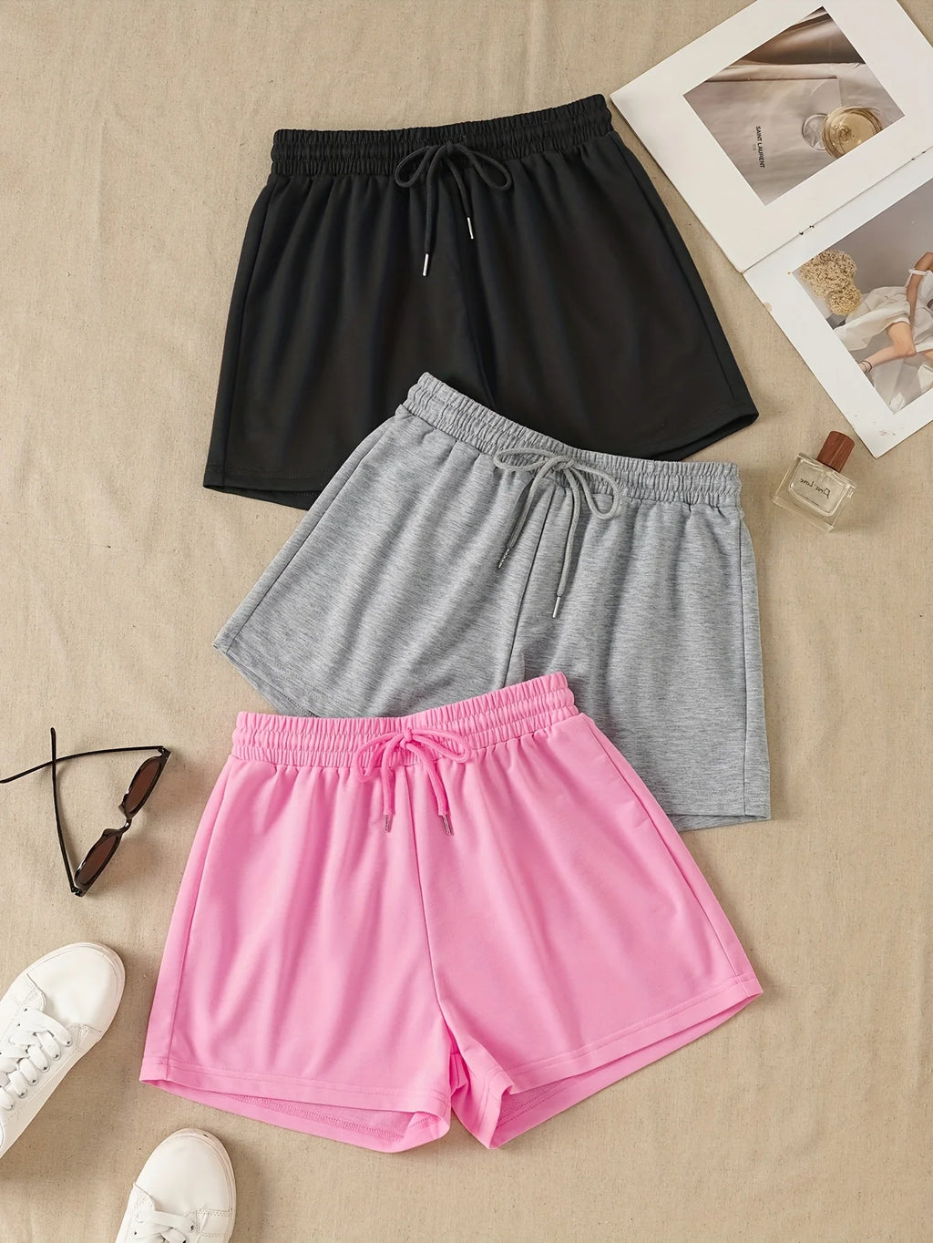 Three Women's Simple Drawstring Sports Shorts, Suitable for Wearing as Outerwear in a Casual Style, Are Comfortable and Soft.