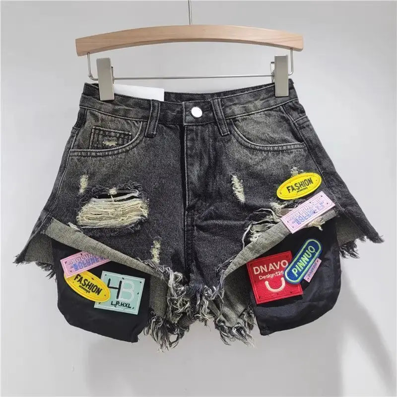 2026 Summer fringed Denim Hot pants Women's Streetwear Fashion Sexy Fringed Slimming Denim hot pants Personality Ripped Shorts