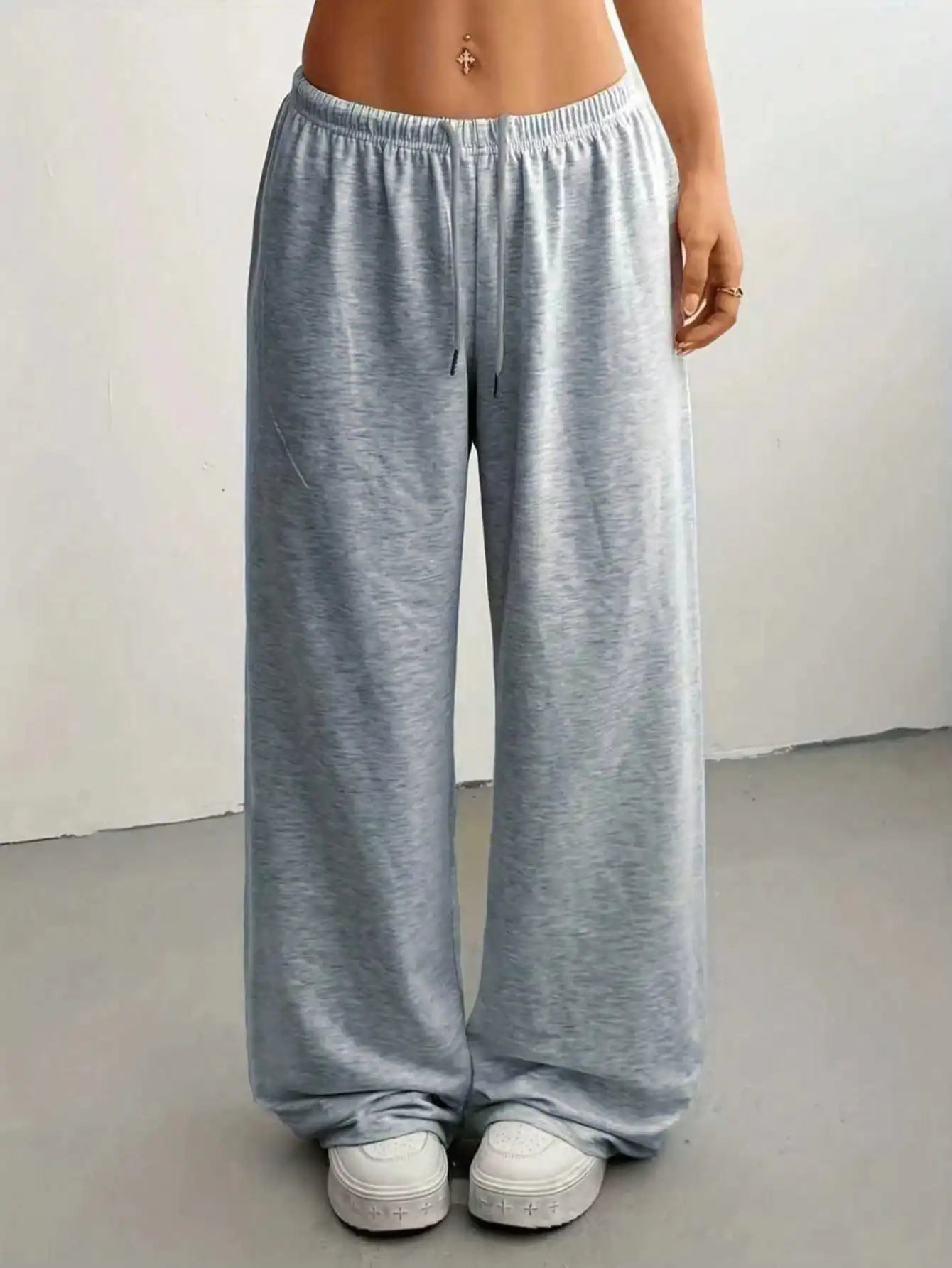 Ladies' casual wide-leg jogging pants, featuring a drawstring elastic waistband, comfortable and loose fit, and a popular style