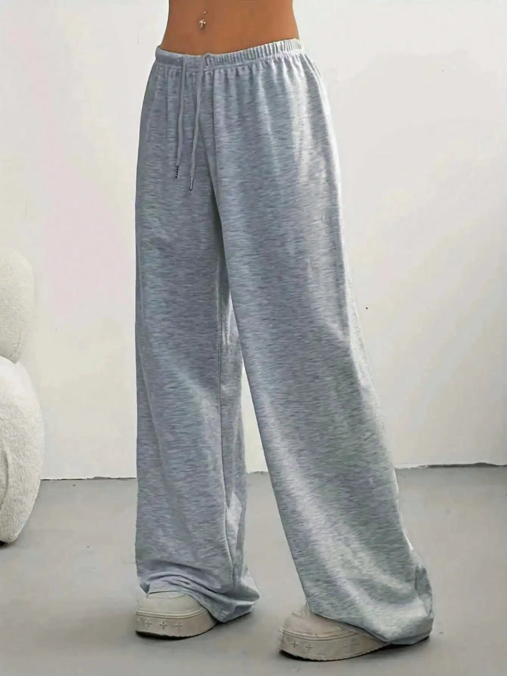 Ladies' casual wide-leg jogging pants, featuring a drawstring elastic waistband, comfortable and loose fit, and a popular style