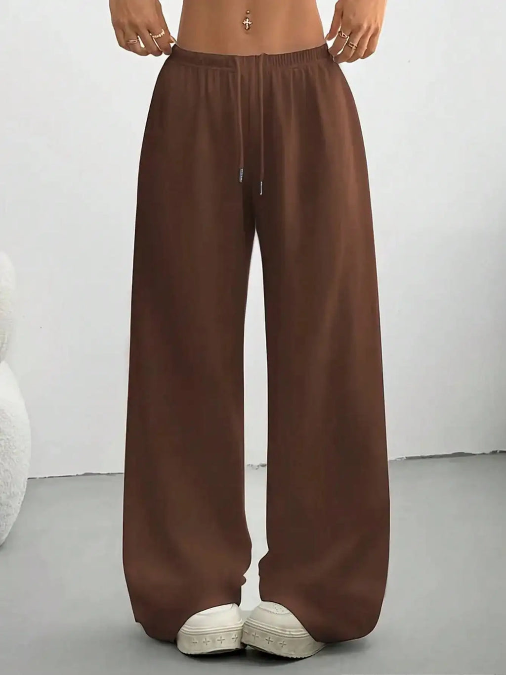 Ladies' casual wide-leg jogging pants, featuring a drawstring elastic waistband, comfortable and loose fit, and a popular style