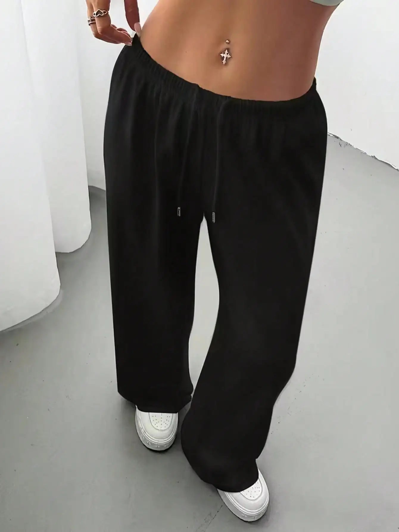 Ladies' casual wide-leg jogging pants, featuring a drawstring elastic waistband, comfortable and loose fit, and a popular style