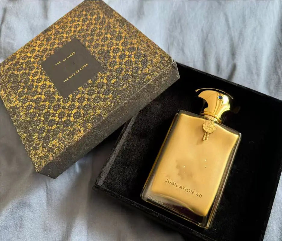 Jubilation 40, a luxurious golden fragrance with rich warm notes. Elegant bottle design, perfect for special occasions, gifts and personal collection.