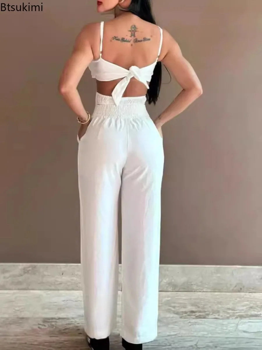 2026 Summer Spaghetti Strap Fashion Jumpsuit Women's Floral Pattern Hollow Casual Asymmetrical Collar Backless Jumpsuit Trousers