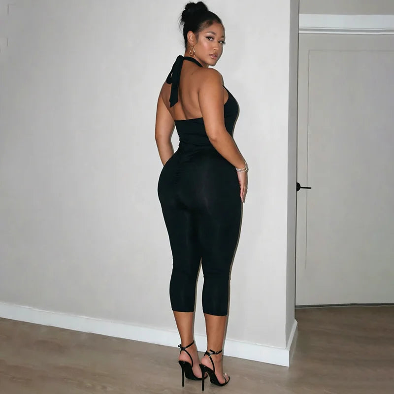 Sexy spicy girl style solid color hollow neck strap seven part jumpsuit