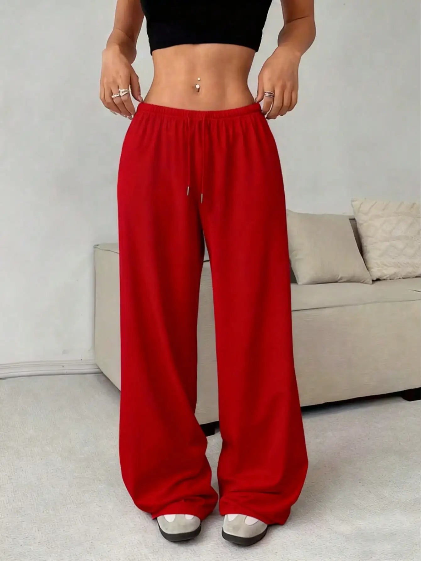 Ladies' casual wide-leg jogging pants, featuring a drawstring elastic waistband, comfortable and loose fit, and a popular style