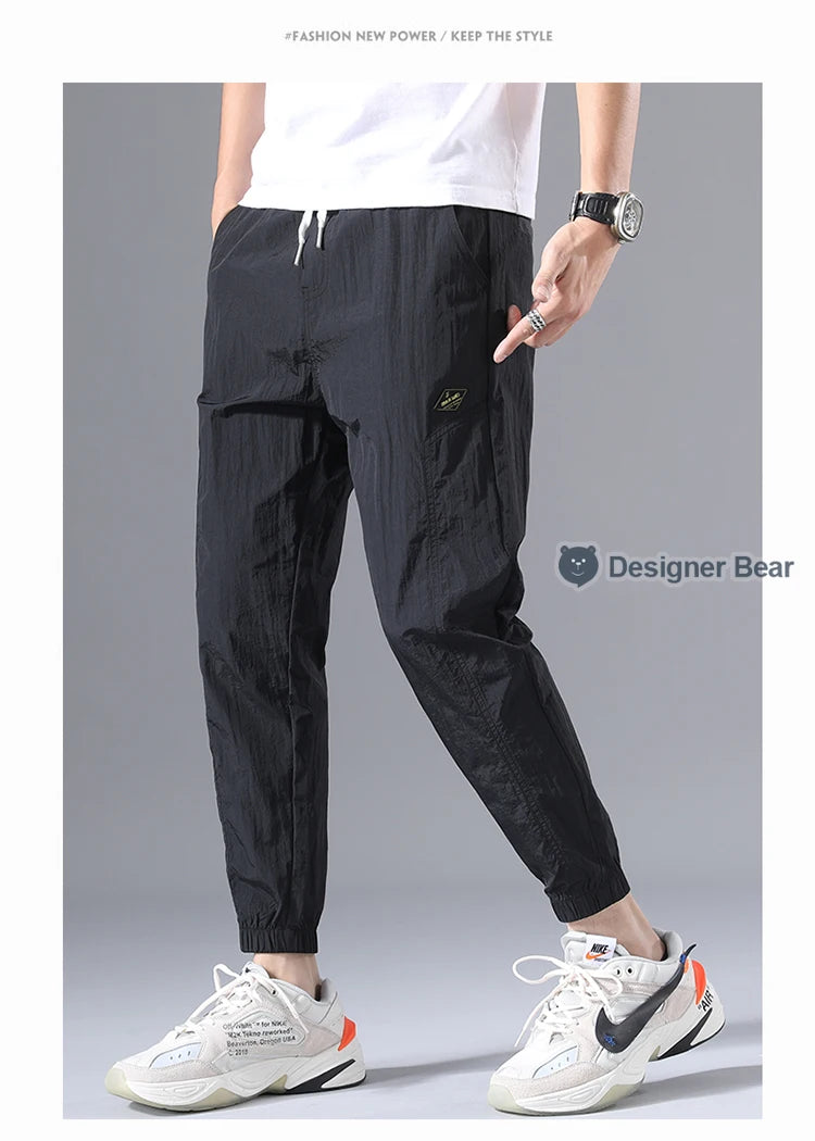 2026 Summer Thin Men's Wrinkled Fabric Loose Tapered Harem Pants Quick-Dry Elastic Cuff Casual Trousers Elastic Waist City Boy